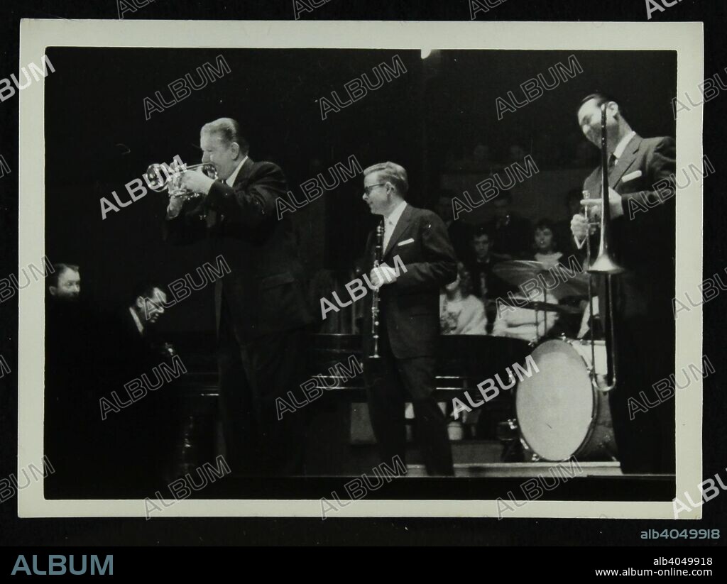 The Eddie Condon All Stars on stage at Colston Hall, Bristol, 1957. Left to right: Eddie Condon (guitar), Gene Schroeder (piano), Wild Bill Davison (cornet), Bob Wilber (clarinet), Robert 'Cutty' Cutshall (trombone).