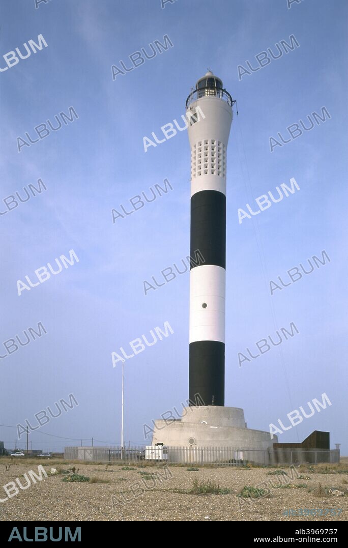 Dungeness lighthouse, Shepway, Kent, 1997. The new lighthouse at Dungeness was built in 1959-60 by Ronald Ward & Partners. It is a tower of pre-stressed concrete with a spiral ramp, and is painted black and white as a daymark.