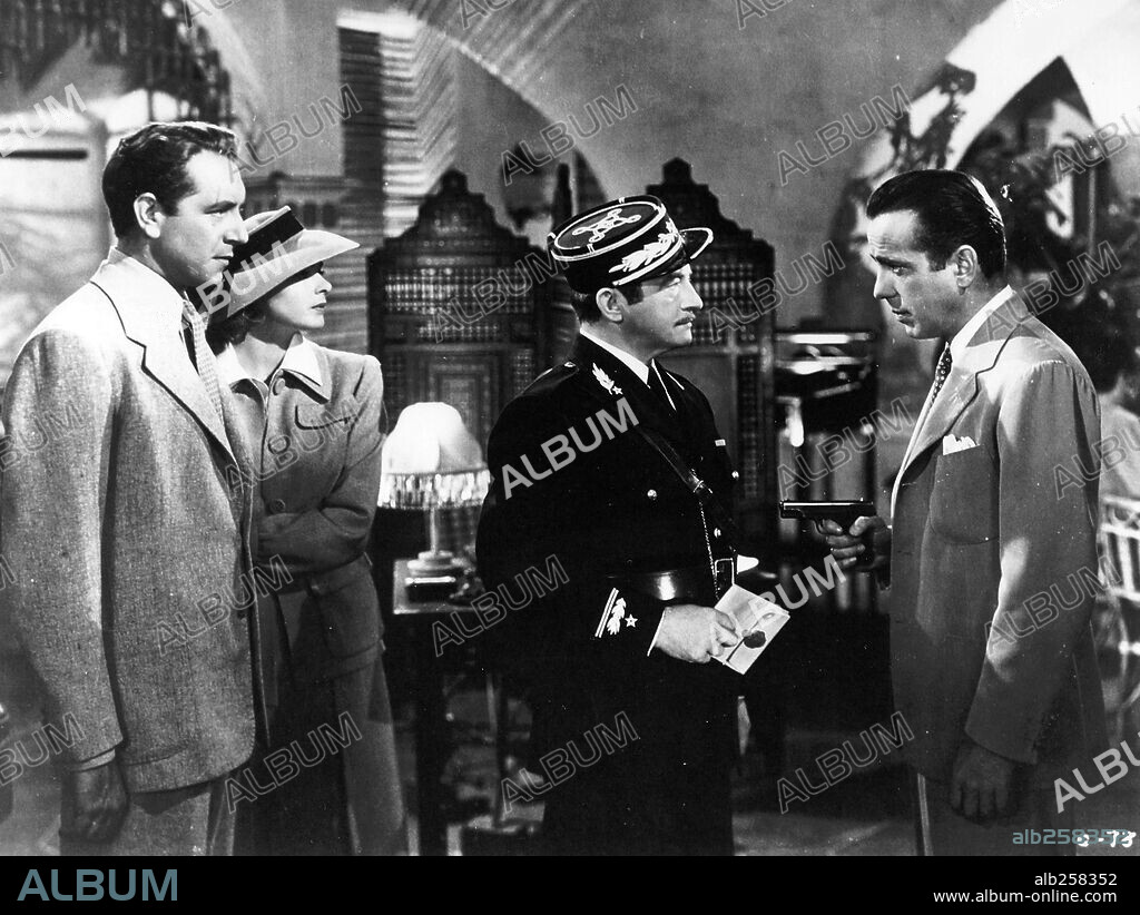 CLAUDE RAINS, HUMPHREY BOGART, INGRID BERGMAN and PAUL HENREID in CASABLANCA, 1942, directed by MICHAEL CURTIZ. Copyright WARNER BROTHERS.
