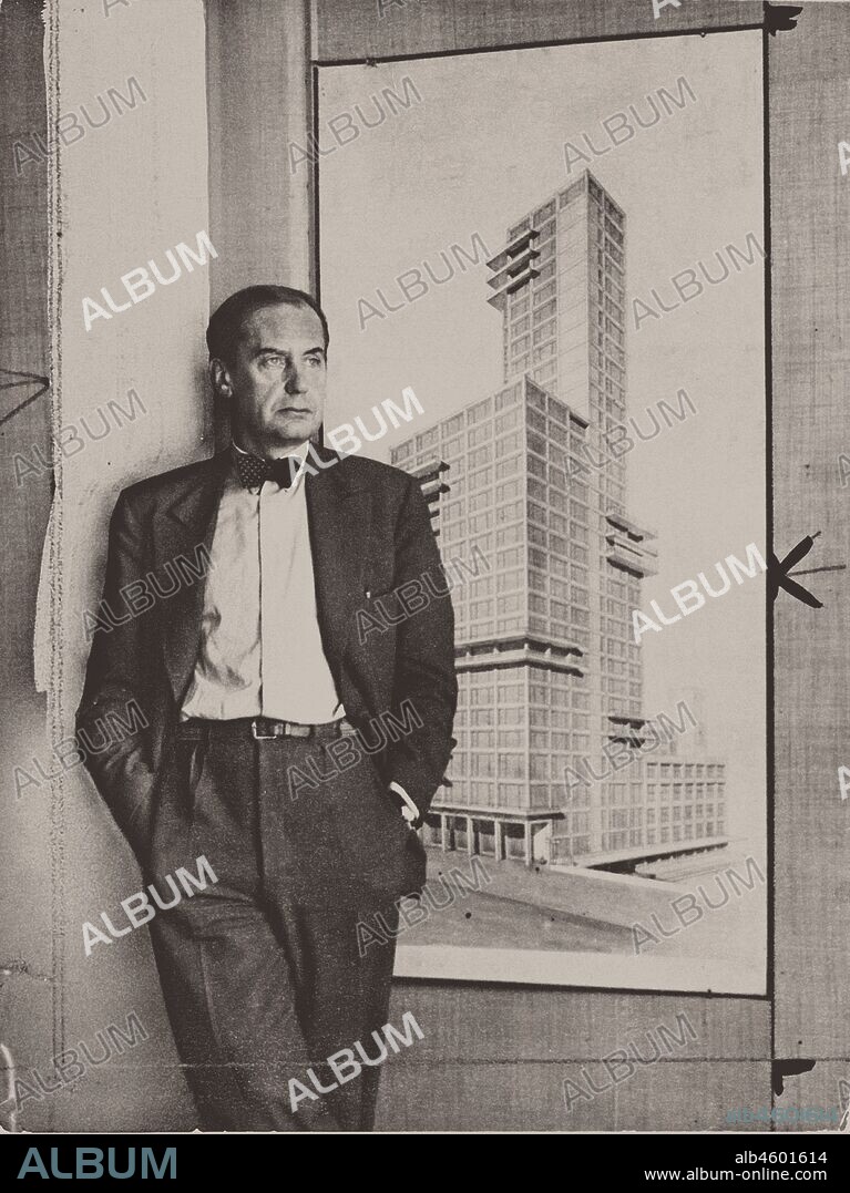 ANONYMOUS. Walter Gropius with the design for the 1922 Chicago Tribune Tower competition.