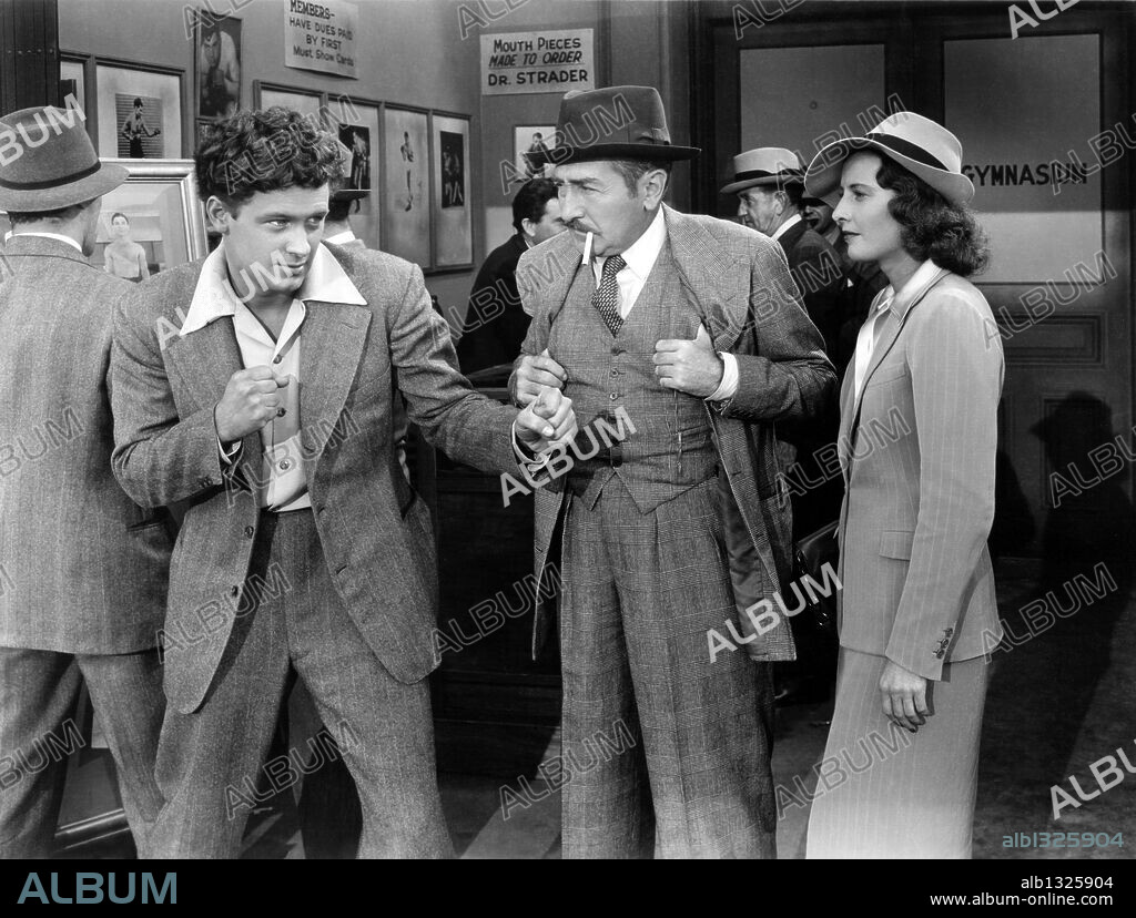 ADOLPHE MENJOU, BARBARA STANWYCK and WILLIAM HOLDEN in GOLDEN BOY, 1939, directed by ROUBEN MAMOULIAN. Copyright COLUMBIA PICTURES.
