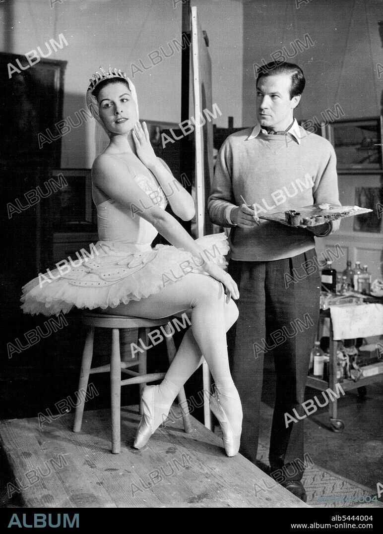 The Grace Of Violetta -- Described as 'the world's most beautiful ballerina' Russian-born Violetta Elvin poses for artist Bernard Powell in his London studio today. (Sunday). Mr. Powell confesses to being enchanted by her hands, and, in arranging the pose, ensured that it showed he 'extraordinary grace of her hands and arms'. Violetta has already been painted by celebrated artists, including Italy's Bruno Cassinari whose abstract painting of her was bought for £800 by an Italian industrialist who saw her dance at the Scala Theatre in Milan in 1952. February 13, 1955. (Photo by Reuterphoto).