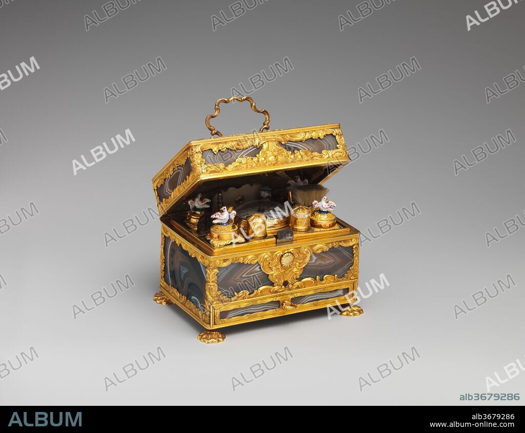 Nécessaire. Culture: British, London. Dimensions: Overall: 3 1/4 × 4 1/4 × 3 1/8 in. (8.3 × 10.8 × 7.9 cm). Maker: Watchmaker: Joseph Martineau Sr. (active 1744-70). Date: mid-18th century.
This nécessaire, fitted with a drawer below, contains a variety of toilet, sewing, and writing implements as well as a watch. It was part of the collection of English goldsmith work belonging to Admiral Frederic Harris, a noted philatelist and engineer known for his design of floating dry docks.