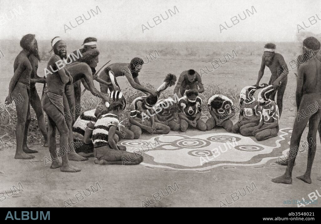 A Totemic Ceremony of the Warramunga tribe, Australia. The final ceremony in connection with the Wollunqua Totem of the Warramunga Tribe. The decorations are being taken off the performers. The drawing represents the wanderings of the totem ancestor, a mythic snake. After a 19th century photograph. From Customs of The World, published c.1913.