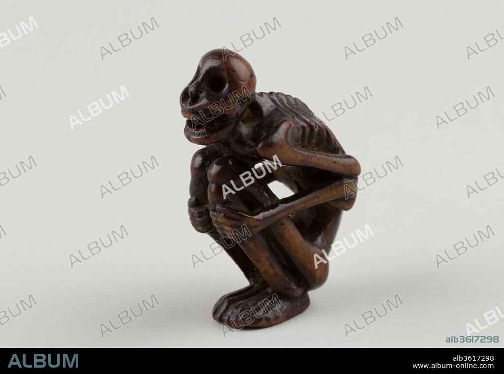 Netsuke of Crouching Figure of a Skeleton. Culture: Japan. Dimensions: H. 2 5/8 in. (6.7 cm); W. 1 1/8 in. (2.9 cm). Date: 19th century.