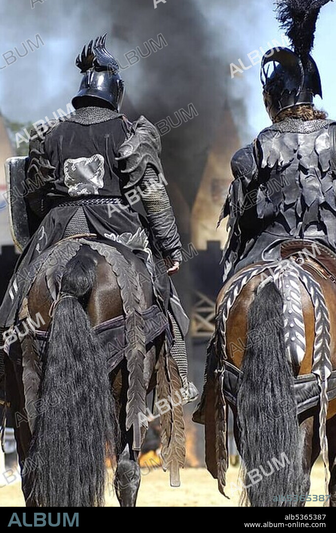 Two black knights from behind sit in their horses, in the background black cloud of smoke, knight festival Kaltenberger Ritterspiele, Kaltenberg, Upper Bavaria, Germany, Europe.