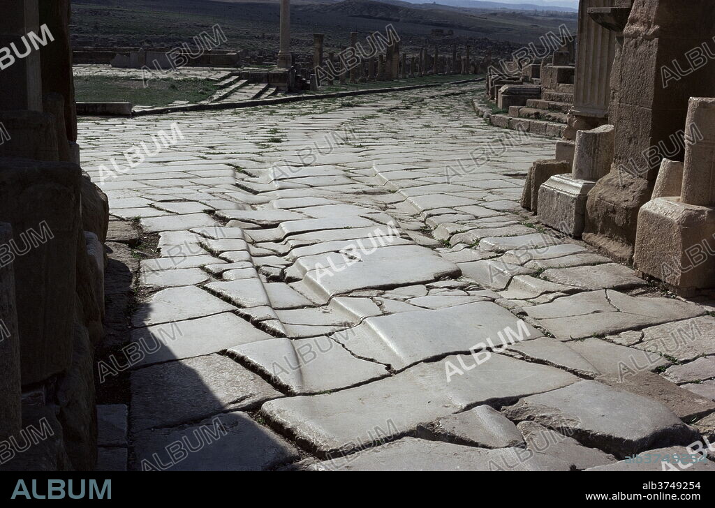 Chariot wheel ruts by the West Gate, Roman site of Timgad, UNESCO World Heritage Site, Algeria, North Africa, Africa.