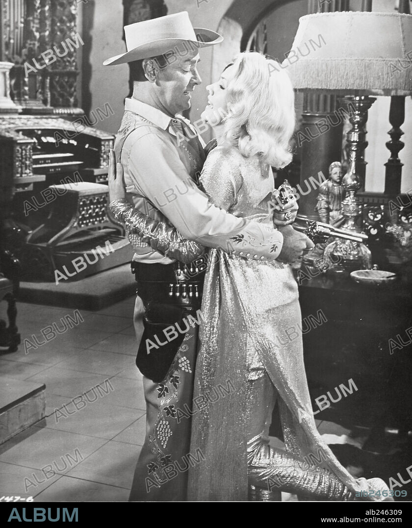 ALAN LADD y CARROLL BAKER en LOS INSACIABLES, 1964 (THE CARPETBAGGERS), dirigida por EDWARD DMYTRYK. Copyright PARAMOUNT/EMBASSY.