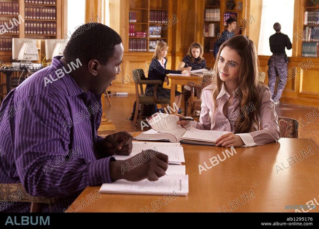 LILY COLLINS and QUINTON AARON in THE BLIND SIDE, 2009, directed by JOHN LEE HANCOCK. Copyright ALCON ENTERTAIMENT / NELSON, RALPH.