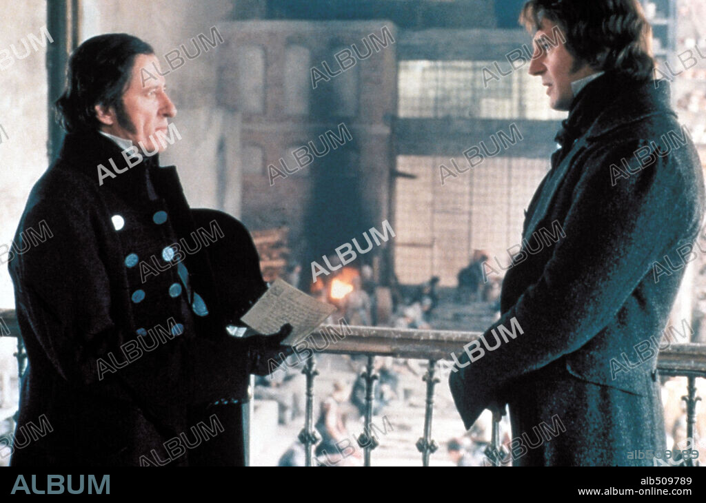 GEOFFREY RUSH and LIAM NEESON in LES MISERABLES, 1998, directed by BILLE AUGUST. Copyright MANDALAY ENTERTAIMENT.