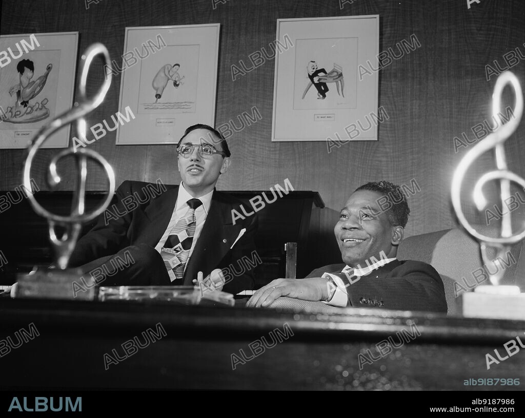 WILLIAM PAUL GOTTLIEB. Portrait of Bernie Benjamin and George (George David) Weiss in their office, New York, N.Y., ca. Apr. 1947.