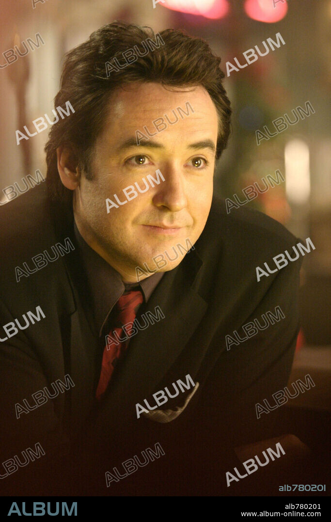 JOHN CUSACK en LA COSECHA DE HIELO, 2005 (THE ICE HARVEST), dirigida por HAROLD RAMIS. Copyright FOCUS FEATURES/BONA FIDE PRODUCTIONS.