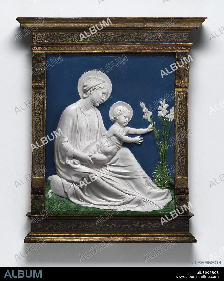 LUCA DELLA ROBBIA. Madonna and Child. Dated: c. 1475. Dimensions: overall: 48.3 x 38.9 cm (19 x 15 5/16 in.)  framed: 102.2 x 62.2 x 13.3 cm (40 1/4 x 24 1/2 x 5 1/4 in.). Medium: glazed terracotta.