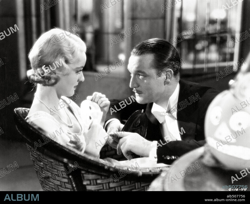 BETTE DAVIS and WALTER BYRON in THE MENACE, 1932, directed by ROY WILLIAM NEILL. Copyright COLUMBIA PICTURES.