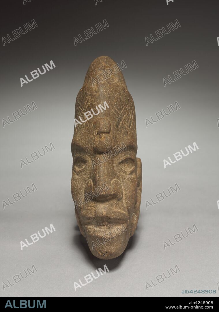 Ceremonial Axe-Head, 600-1100. Mexico, Classic Veracruz (Totonac or Tajin). Stone; overall: 20 x 6.8 x 14.3 cm (7 7/8 x 2 11/16 x 5 5/8 in.).