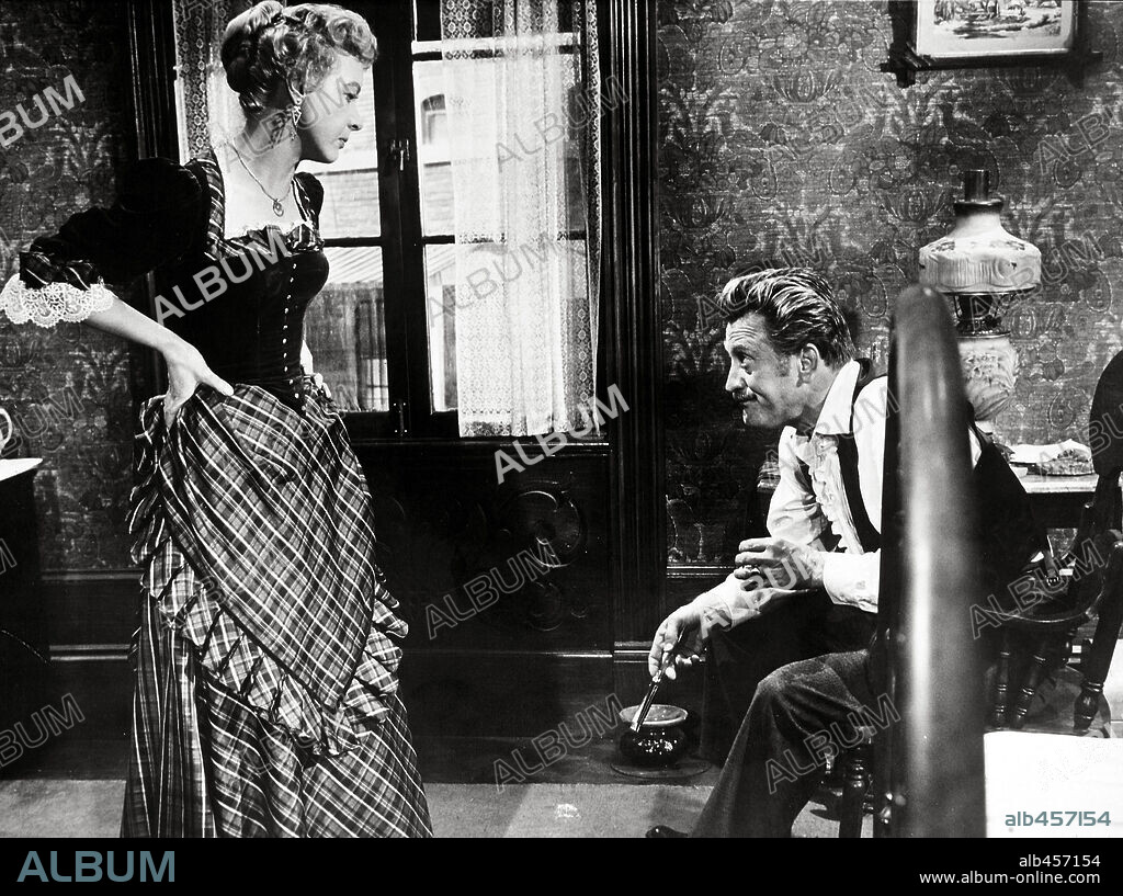 JO VAN FLEET and KIRK DOUGLAS in GUNFIGHT AT THE O. K. CORRAL, 1957, directed by JOHN STURGES. Copyright PARAMOUNT PICTURES.