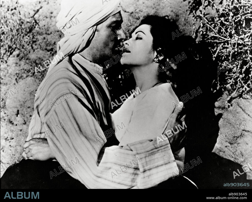 CARLOS THOMPSON and YVONNE DE CARLO in FORT ALGIERS, 1953. Copyright ALLIED ARTISTS.
