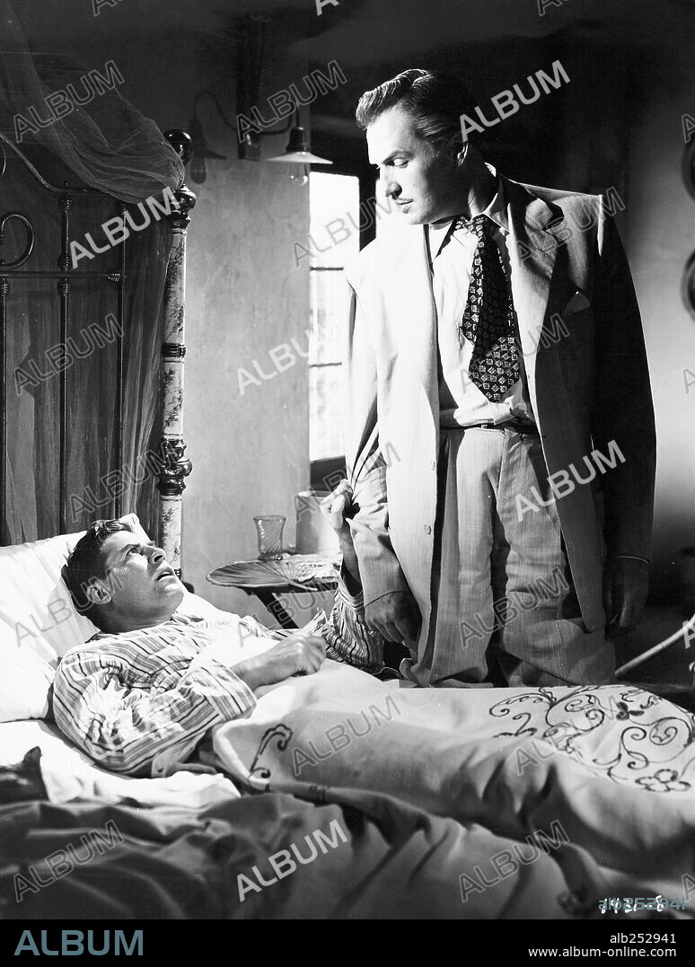 JOHN HODIAK and VINCENT PRICE in THE BRIBE, 1949, directed by ROBERT Z. LEONARD. Copyright M.G.M.
