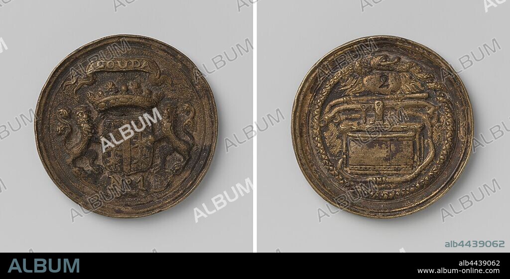 Gouda, fire spray token from sprayer 1 with no. 2, Brass token. Obverse:  crowned coat of arms, flanked by two lions under a ribbon with inscription  above the number. 1. Re - Album alb4439062