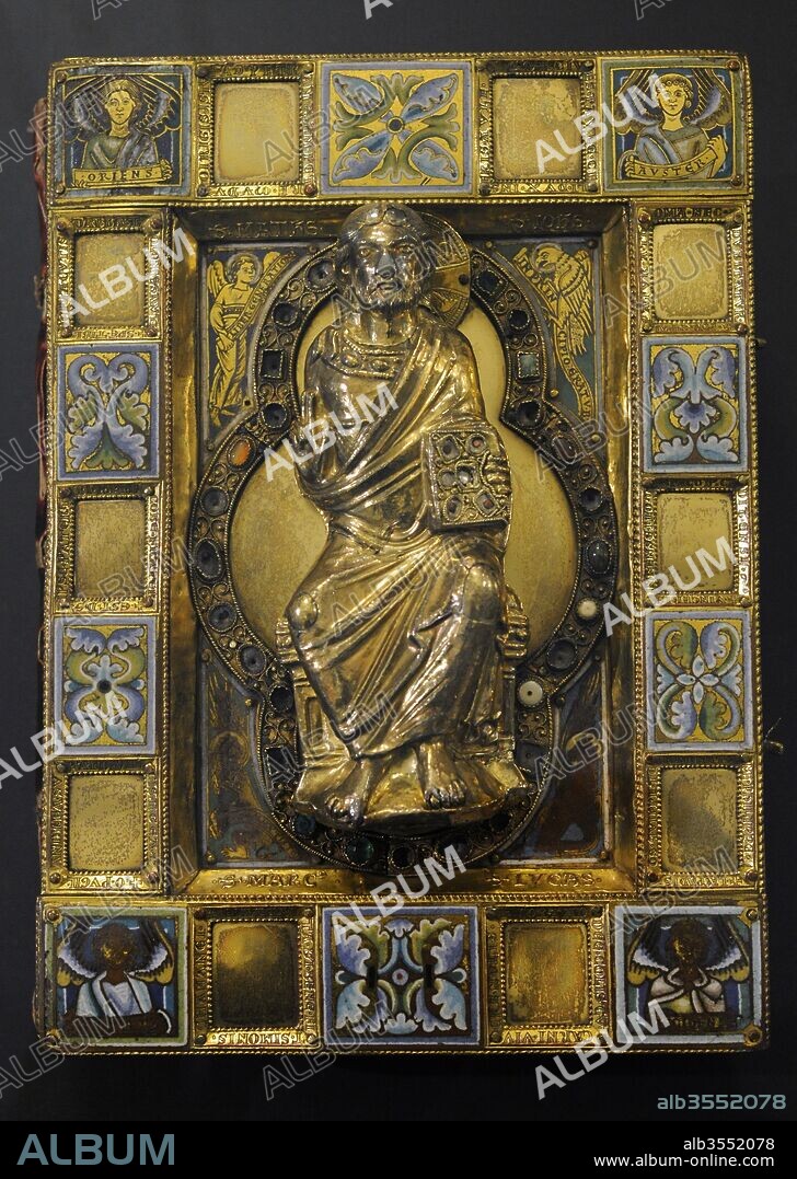 Golden book cover of a Carolingian Gospel Book. Cologne, c. 1160-1180. Germany. Gilt silver with enamel, studded with stones. Museum Schnu_tgen. Cologne, Germany.