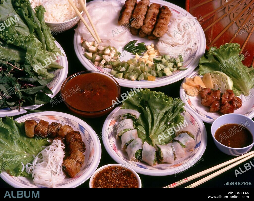 <i>Nem nng</i> can be eaten alone as an appetizer or snack, and dipped in Nc chm (dipping sauce), or with a peanut dip. Nc chm is fish sauce diluted with water and flavored with sugar, lime juice, chopped raw garlic, chopped fresh bird's eye chili (Thai chili)/cayenne pepper, and sometimes with vinegar. The peanut sauce is made of peanut butter and hoisin sauce, flavored with fish sauce and crushed garlic, topped with crushed roasted peanut. It is served with fresh vegetables such as lettuce, julienned pickled vegetables like carrots and white radishes, and fresh herbs like mint and basil.