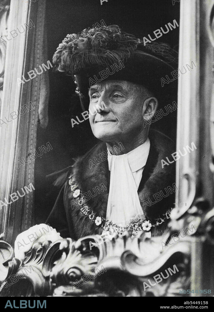 Sir George Broadbridge former lord mayor of London, smiles from his staff coach during the London lord *****. This year a semi-military procession. November 01, 1936. (Photo by Universal Pictorial Press Agency).