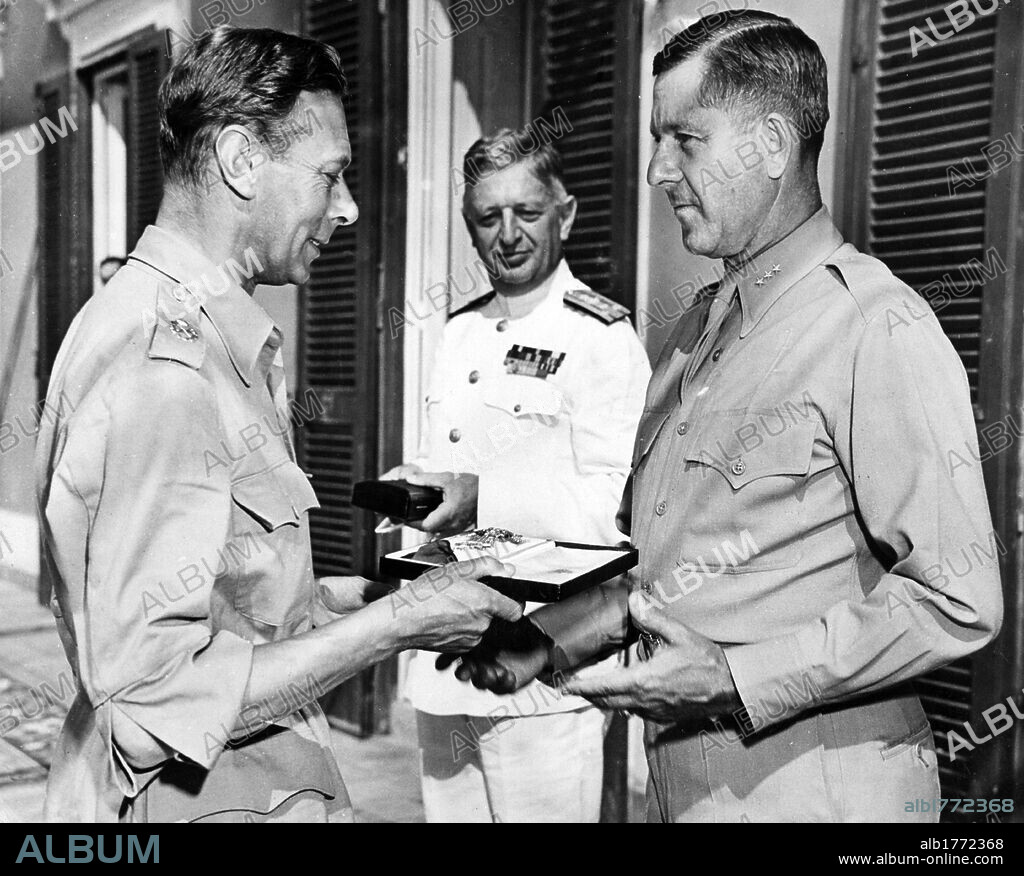 King George VI awarding a decoration to Jacob Devers. King George VI of the United Kingdom awarding U.S. General Jacob L. Devers with the 'Most Honourable Order of the Bath' chivalry decoration. Caserta, July 1944.