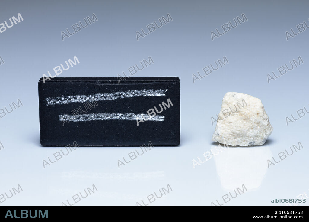Dolomite streak test. The streak test is used to determine the colour of a mineral in powdered form. It is done by scraping a specimen across a piece of unglazed porcelain known as a streak plate. Dolomite has a white streak. It is an sedimentary rock composed of calcium magnesium carbonate (CaMg(CO3)2).