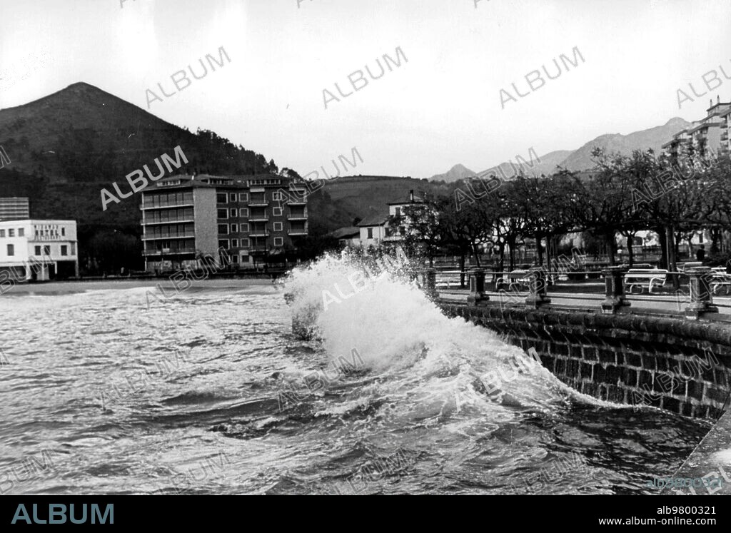 1967. View of the high tide of the town Castro Urdiales (Cantabria).