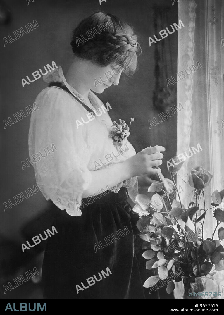 Elizabeth Harrison Walker (1897-1955), Daughter of U.S. President Benjamin Harrison, Married James Blaine Walker, Three-Quarter Length Portrait with Vase of Roses, Bain News Service, 1921.