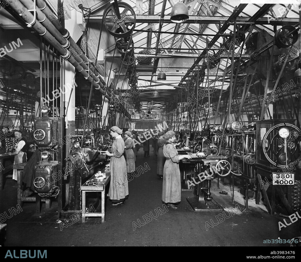 The Birmingham Small Arms factory, Small Heath, Birmingham, February 1917. Men and women working on the machines in machine shop number one during the First World War. One of series of photographs of the BSA factory which produced rifles, Lewis guns, shells and military vehicles.