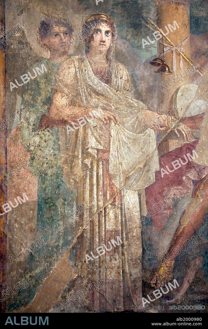 Italy, Naples Museum, from Pompeii, House of the Tragic Poet  (VII, 8, 3), Zeus and Hera Wedding . This scene represents what for ancients was the most sacred wedding of all, between Zeus and Hera, a majestic figure in a peplos that is as substantial and imposing as a Doric column. The Erotes, in the bottom right corner, allude to the romantic aspect of the event, while the goddess is accompanied by a winged spirit who may personify Mount Ida, where the wedding took place.