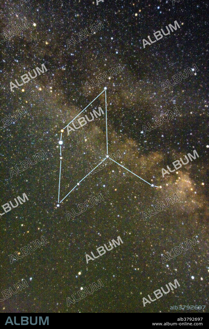 Aquila constellation. The Milky Way running through the constellation Aquila, the eagle. North is at top. The bright star in the centre is Altair (Alpha Aquilae). This star is flanked by Tarazed (Gamma Aquilae, above) and Alshain (Beta Aquilae, below). Altair is the 12th brightest star in the sky and lies 16 light years from Earth. The Milky Way is the band of light crossing the sky. A prominent lane of dust is seen here, blocking the light of the stars behind it.