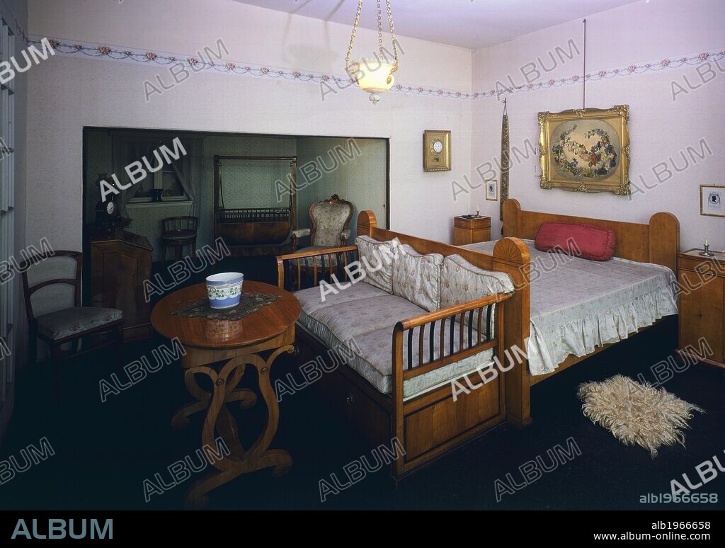 Marital bedroom in cherry wood, Biedermeier period, reconstructed in the Federal Collection of Period Furniture (Bundessammlung Alter Stilmobel), Vienna, Austria.
