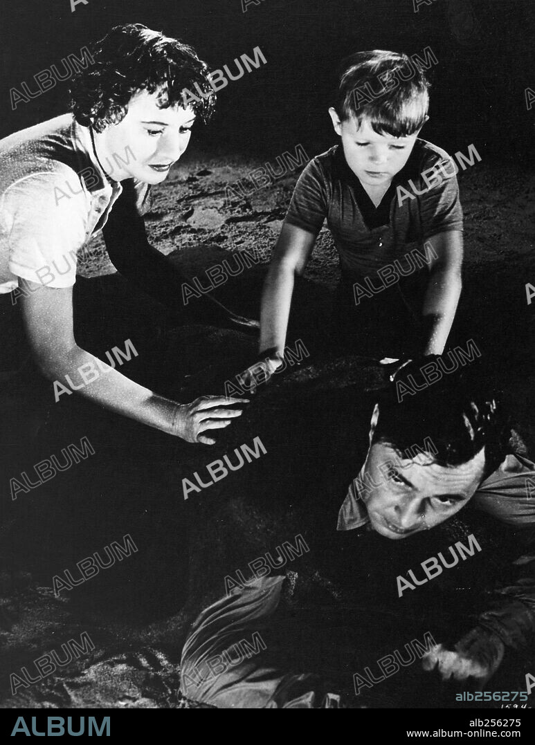 BARBARA STANWYCK, BARRY SULLIVAN and LEE AAKER in JEOPARDY, 1953, directed by JOHN STURGES. Copyright M.G.M.