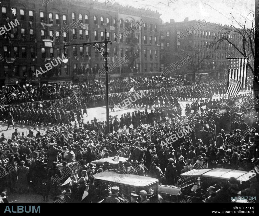 369th Infantry was the first New York regiment to parade as veterans of Great War. General view of parade and reviewing stand, 1919. The 369th Infantry Regiment, formerly the 15th New York National Guard Regiment, was an infantry regiment of the United States Army that saw action in World War I and World War II. The 369th Infantry is known for being the first African-American and Puerto Rican regiment to serve with the American Expeditionary Force during World War I. The regiment was nicknamed the Harlem Hellfighters and the Black Rattlers. By the end of the war, 171 members of the 369th were awarded the Legion of Honor. At the end of the war, the 369th returned to New York City, and in February 1919, paraded through the city. Thousands lined the streets to see them: the parade began on Fifth Avenue at 61st Street, proceeded uptown past ranks of white bystanders, turned west on 110th Street, and then swung on to Lenox Avenue, and marched into Harlem, where black New Yorkers packed the sidewalks to see them. Despite the fact that they were decorated upon returning to New York the 369th Regiment were not allowed to participate in Victory Parade of 1919.