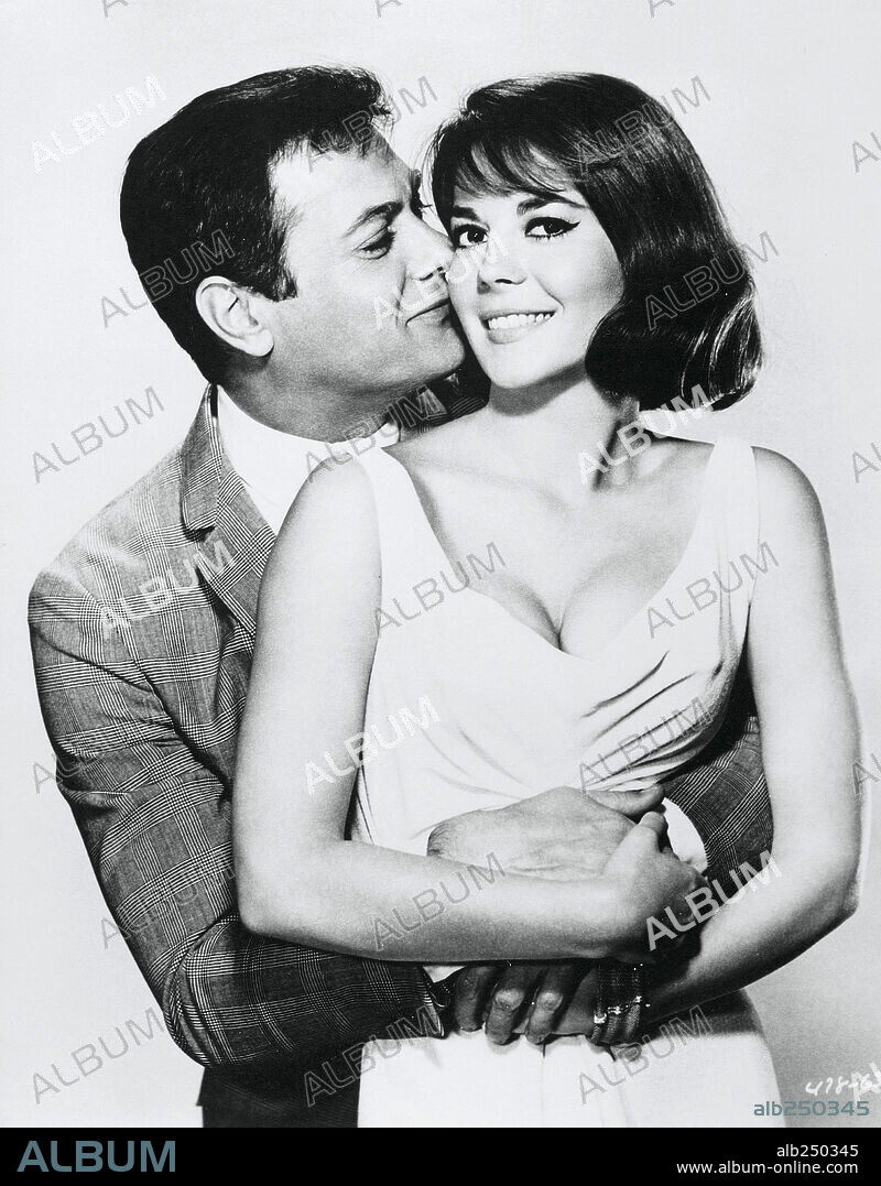 NATALIE WOOD y TONY CURTIS en LA PÍCARA SOLTERA, 1964 (SEX AND THE SINGLE GIRL), dirigida por RICHARD QUINE. Copyright WARNER BROTHERS.