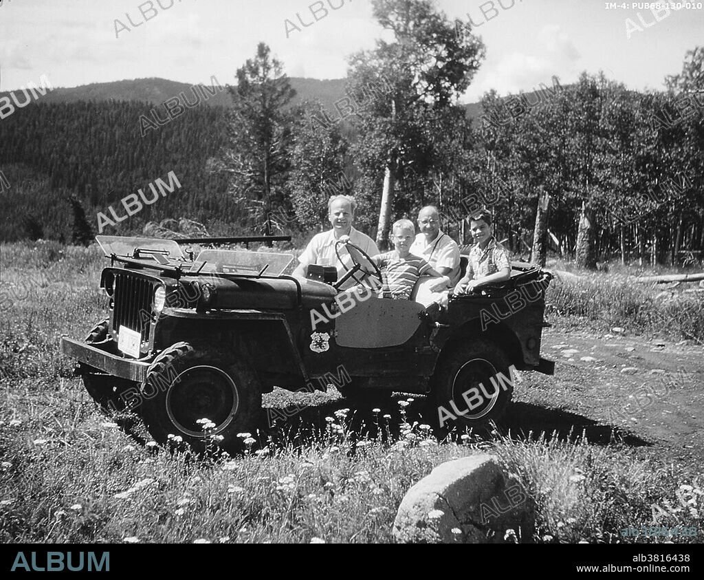 Bethe and Fermi riding in jeep on the Los Alamos grounds during the Manhattan Project. Hans Albrecht Bethe (July 2, 1906 - March 6, 2005) was a German-American nuclear physicist, and Nobel laureate in physics for his work on the theory of stellar nucleosynthesis, 1967. He also made important contributions to quantum electrodynamics, nuclear physics, solid-state physics and astrophysics. During World War II, he was head of the Theoretical Division at the Los Alamos laboratory which developed the first atomic bombs where he played a key role in calculating the critical mass of the weapons, and did theoretical work on the implosion method used in both the Trinity test and the "Fat Man" weapon dropped on Nagasaki, Japan. Enrico Fermi (1901-1954) was an an Italian-born, naturalized American physicist particularly known for his work on the development of the first nuclear reactor, Chicago Pile-1, and for his contributions to the development of quantum theory, nuclear and particle physics, and statistical mechanics. He was awarded the 1938 Nobel Prize in Physics for his work on induced radioactivity.