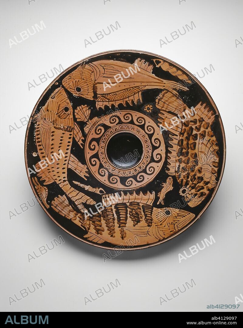 ANCIENT GREEK. Fish Plate. Greek; Athens. Date: 400 BC-370 BC. Dimensions: 5.1 × 34 × 34 cm (2 × 13 3/8 × 13 3/8 in.). Terra-cotta, decorated in the red-figure technique. Origin: Athens.