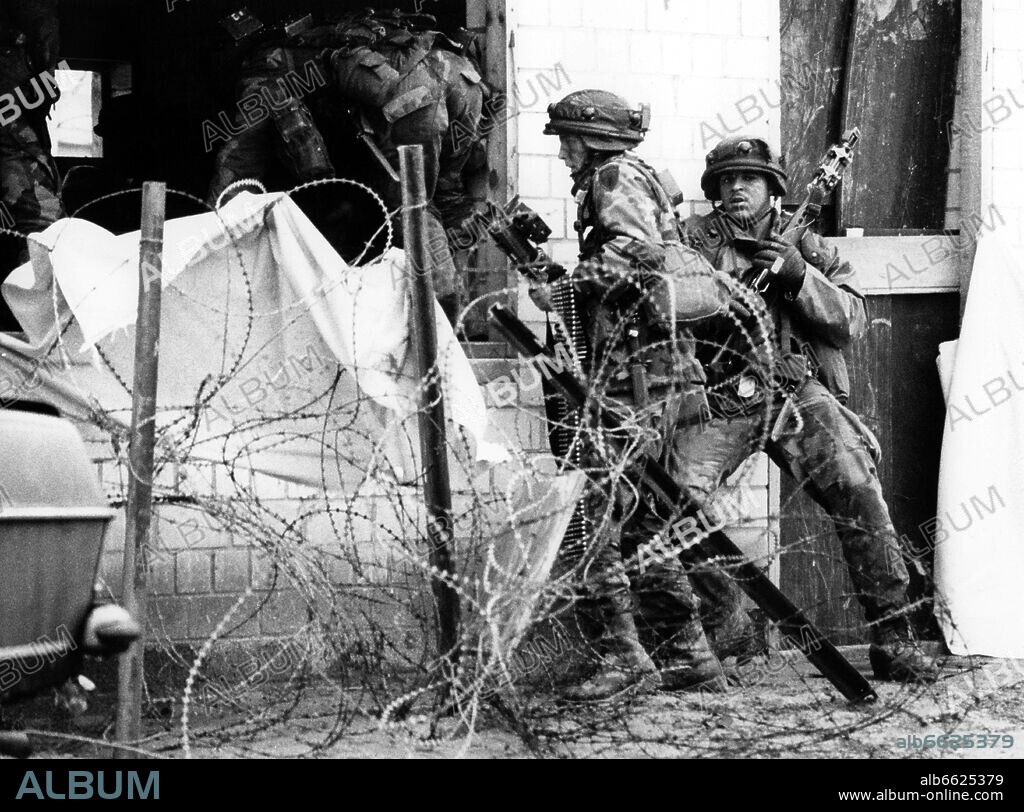 Soldiers if US army troops, stationed in Berlin, during a manoeuvre on the 11th of December in 1985 in the training ghost town "Parks Range" in Berlin Lichterfelde. 11/12/1985