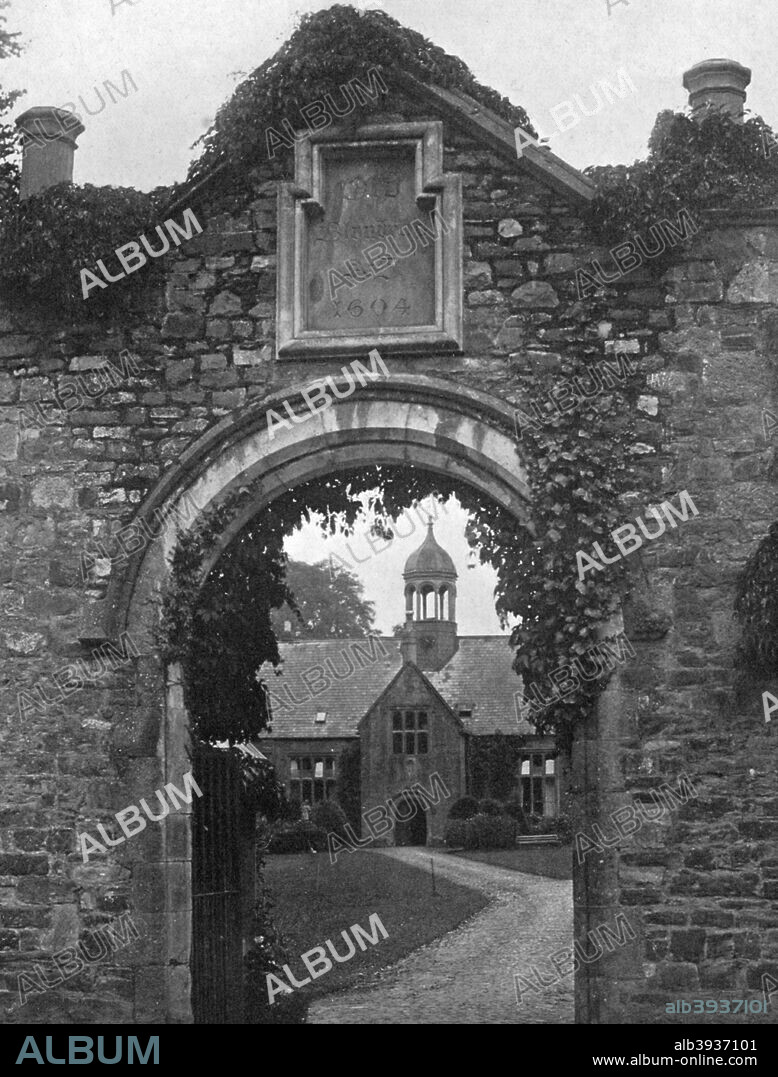 Blundell's School, Tiverton, Devon, 1924-1926. Blundell's is a public school founded in 1604 with funds bequeathed in the will of Peter Blundell, a wealthy clothier. The school relocated to its present site in 1882. A print from Hutchinson's Britain Beautiful, edited by Walter Hutchinson, volume I, 1924-1926.