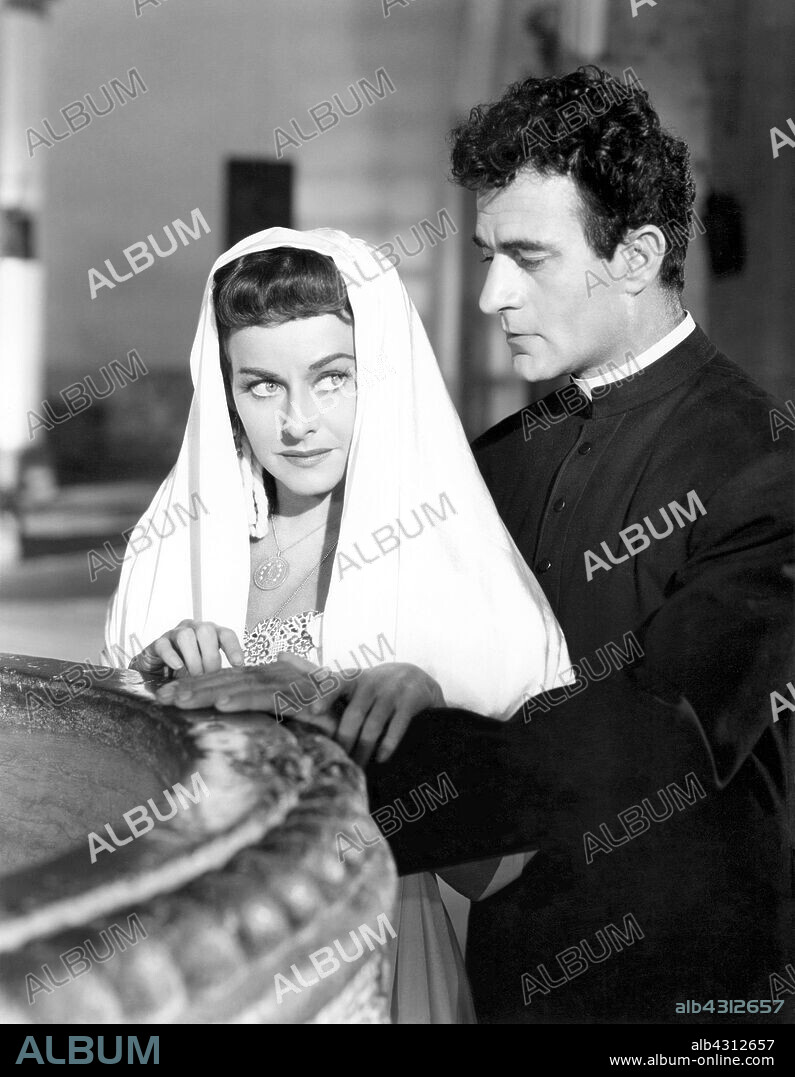 GILBERT ROLAND and PAULETTE GODDARD in THE TORCH, 1950, directed by EMILIO FERNANDEZ. Copyright BERT GRANET.