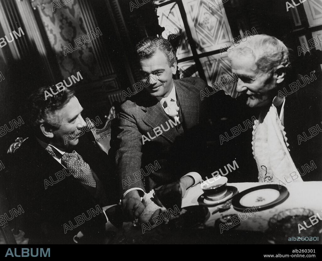 JOSEPH COTTEN, RAY COLLINS and RICHARD BENNETT in THE MAGNIFICENT AMBERSONS, 1942, directed by ORSON WELLES. Copyright RKO.