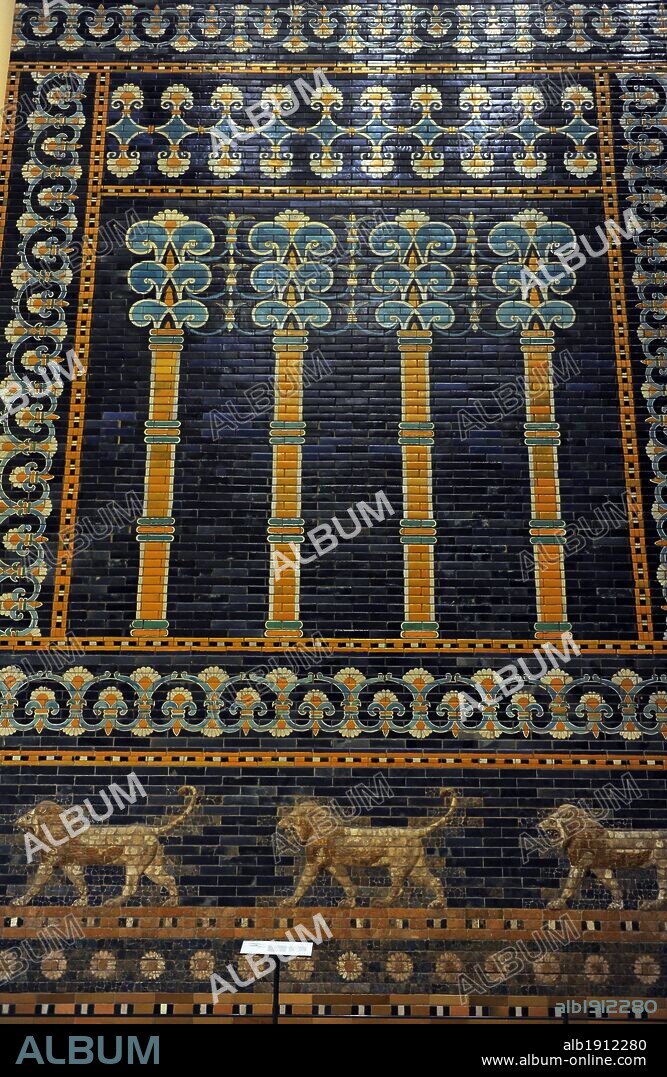 Mesopotamian art. Neo-Babylonian. The Throne Room of  Nebuchadnezzar II. Reconstructed facade. Dated in 580 B.C. Its 56 meters facade was decorated with colored glazed bricks as shows the composition, including stylized palms. The frieze of lions was presumably arranged symmetrically so that the animals faced toward the central main entrance to the trone-room. Pergamon Museum. Berlin. Germany.