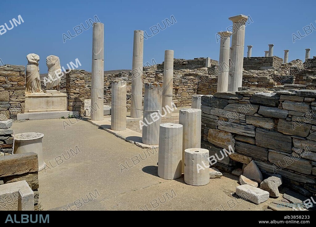 Ancient statues and columns, Cleopatra and Dioscorides, torsos with no heads, Delos island, UNESCO World Heritage Site, Mykonos, Cyclades, Greece