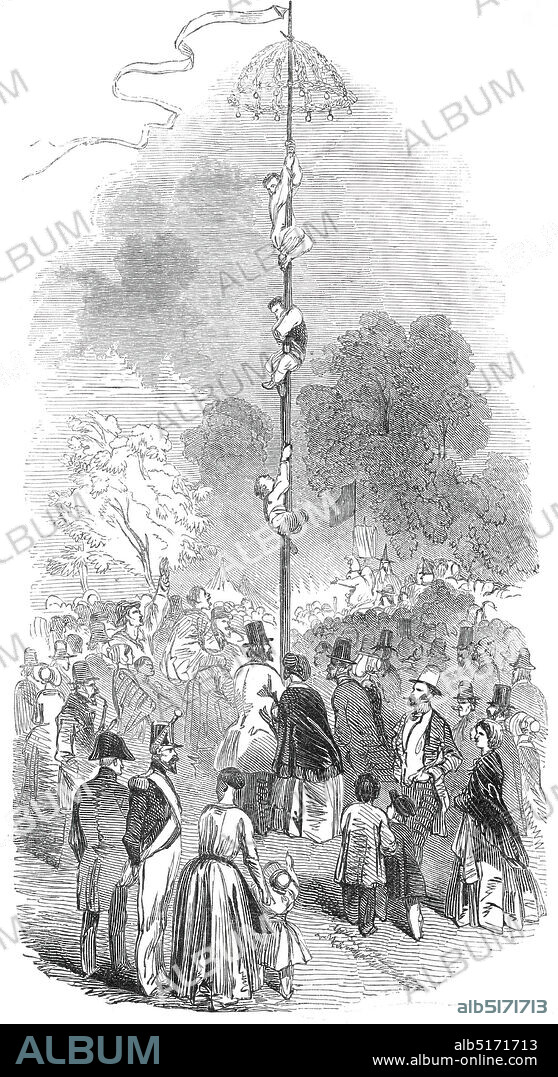 The Mat de Cocagne, 1845. Bastille Day celebrations in Paris. '...the struggle for prizes is carried on by means of a high pole fixed in the Champs Elysees, and the prizes, which generally consist of a watch and some articles of jewellery, are placed at the top of the pole. The pole is well soaped or greased, particularly near the top, so that it is a very difficult matter to attain the summit. Some of the cunning competitors fill their pockets with sand to neutralise the effects of the grease. Sometimes one man mounts on another's shoulders, and they thus render each other mutual assistance to gain the summit; but the moment a slip takes place, it is impossible to maintain a hold of the pole, and down comes the competitor amidst the jeers of the multitude'. It is only by dint of perseverance...that the greasy substance wears off, and the summit is gained'. From "Illustrated London News", 1845, Vol VII.