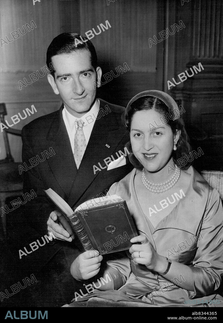 Ex-King Peter Publishers His Memories Holding a copy of his memoirs 'A King's Hertage' is ex-King Peter of Yugoslavia with his wife ex King Queen Alexandra at Claridges Hotel in London this afternoon (Wednesday). The book is to be published tomorrow and the former King and Queen, who were recently reconciled flew into London yesterday in connection with the Publication. March 23, 1955. (Photo by Reuterphoto).