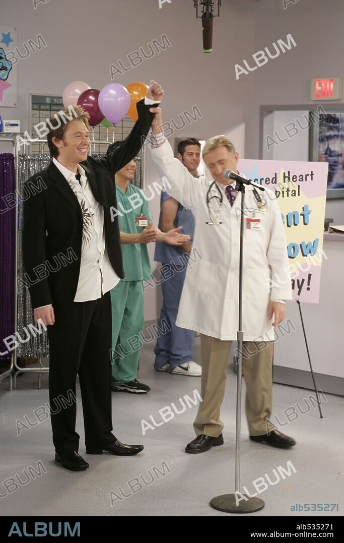 CLAY AIKEN and KEN JENKINS in SCRUBS, 2001, directed by ADAM BERNSTEIN. Copyright NBC / DRINKWATER, PAUL.