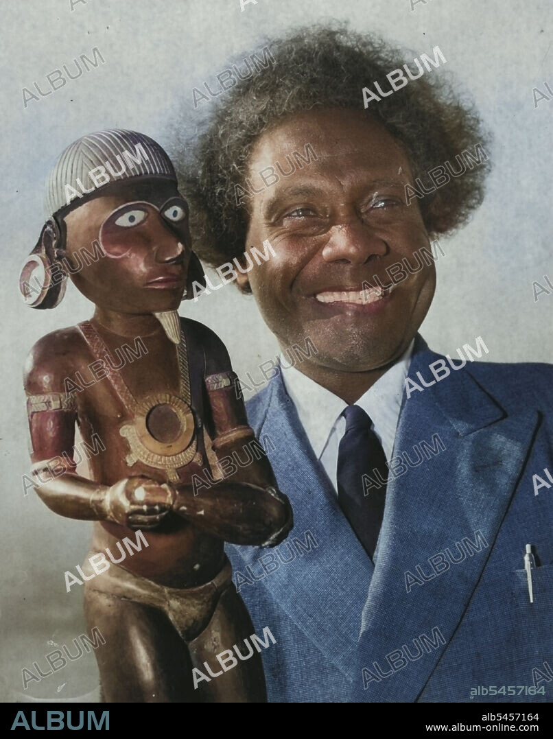 This idol, Kimbo, was worshipped by Solomon Islanders in cannibal days as a god of war.It was brought to Sydney today by Pastor Kata Ragoso, president of Western Solomons Seventh Day Adventist Mission and chief of the Marovo tribe, which saved 200 Allied airmen during the war.Pastor Ragoso, who is on his way home, arrived in Sydney today in the Oronsay, after attending a conference of his church in San Francisco.He is in charge of 4000 parishoners, 56 schools and two hospitals. June 28, 1954.
