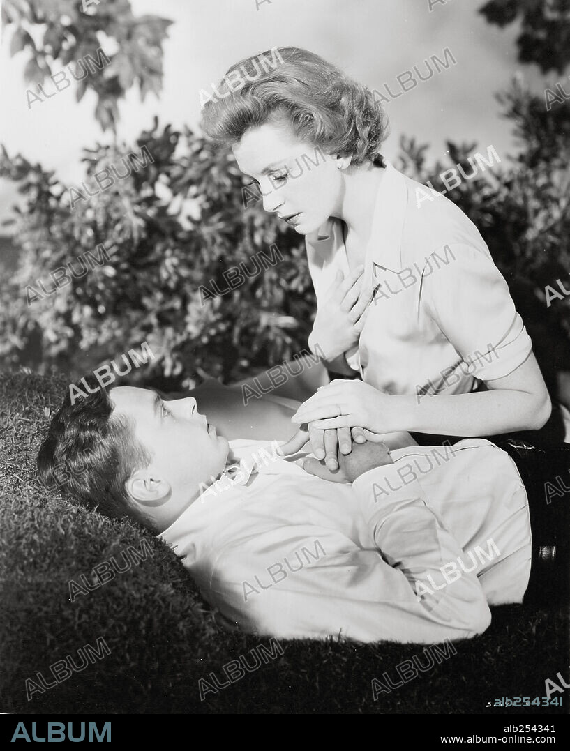 DEBORAH KERR and JOHN KERR in TEA AND SYMPATHY, 1956, directed by VINCENTE MINNELLI. Copyright M.G.M.